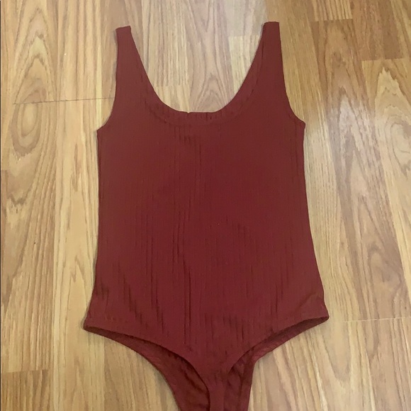 A red button down body suit that is never worn :) - Picture 4 of 4